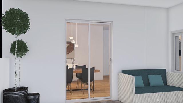 A sliding glass door with a white frame leading indoors
